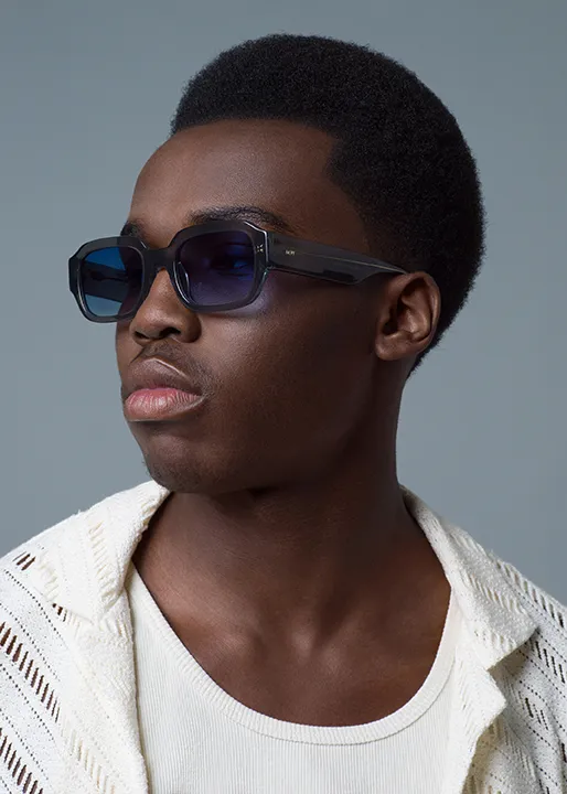 Male model shows off stylish Sculpted Tapered Afro hairstyle
